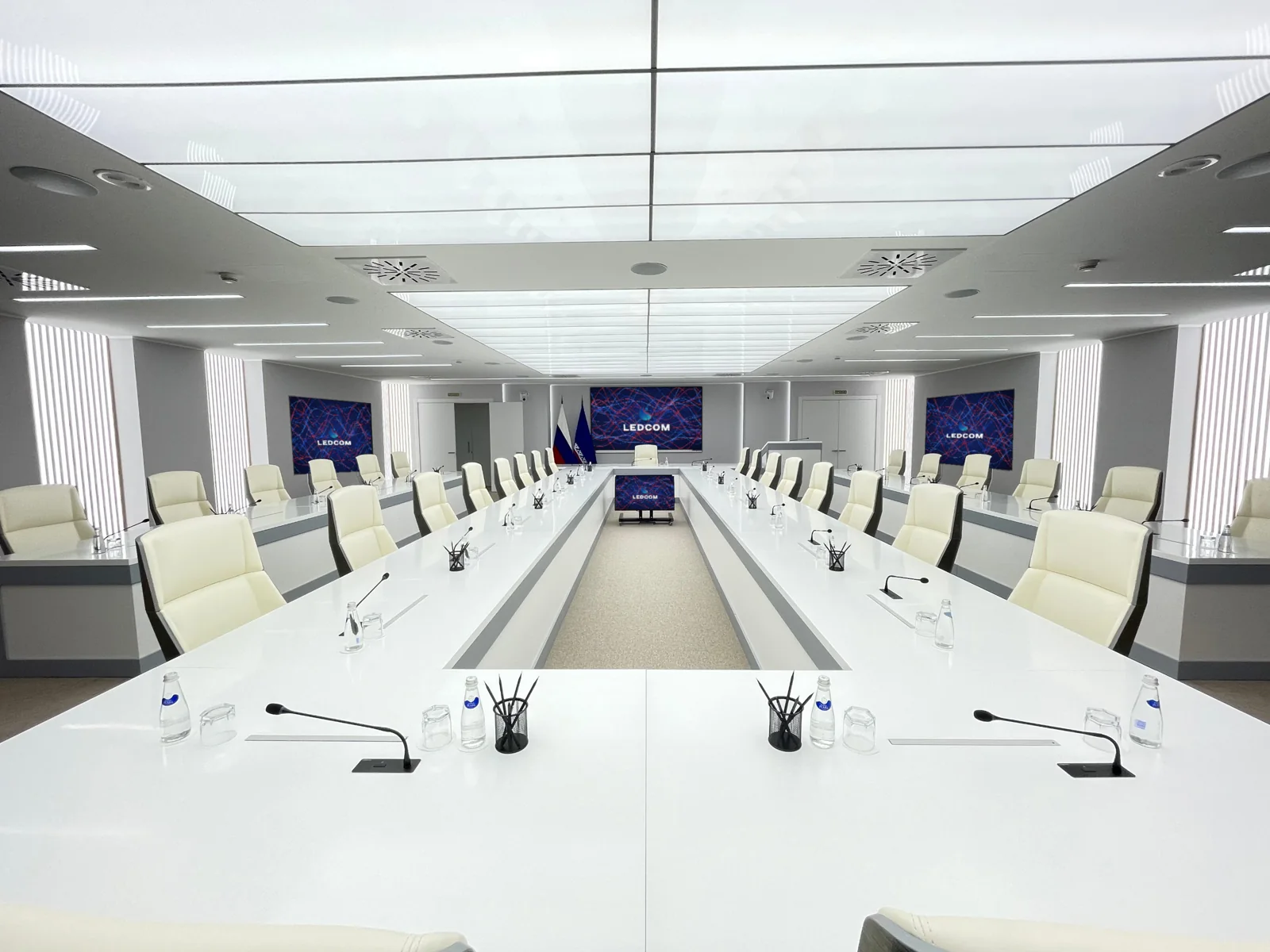 Council chamber with four LEDCOM screens